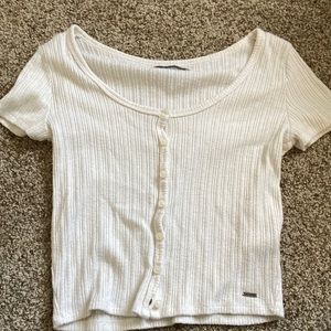 Two women’s Hollister button up crop top tee shirts
